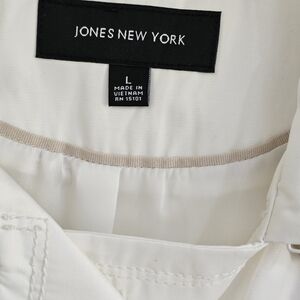 Jones New York Cream jacket with Blue and tan trim.